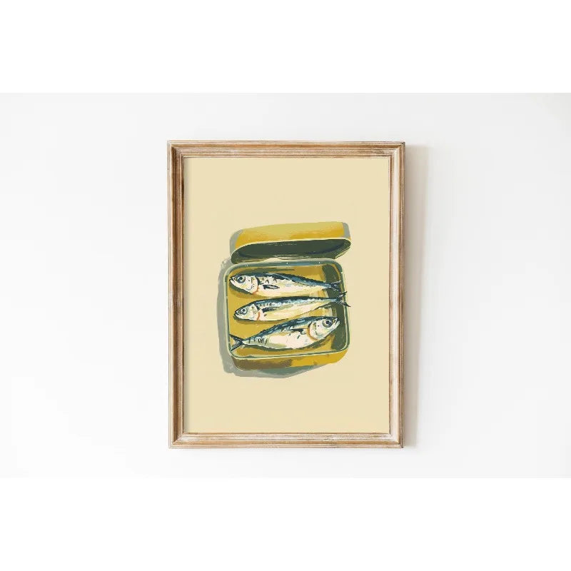 Framed artwork of sardines in a can on a beige background