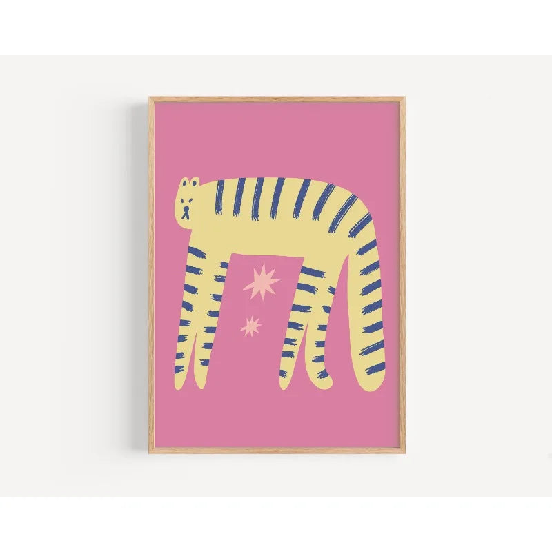 Framed artwork of a yellow tiger with blue stripes on a pink background