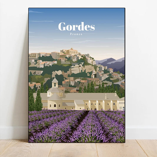 Poster of Gordes, France with a village and lavender field on a white wall. Canvas & Curio