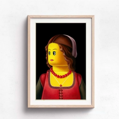 Framed artwork of a stylized portrait with a LEGO-like design on a white wall.