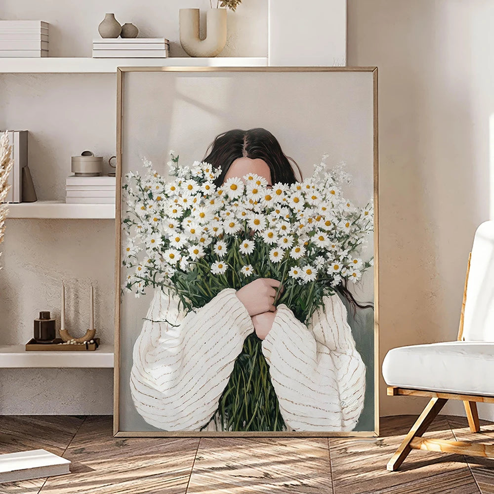 Framed artwork of a person holding flowers in a modern interior setting