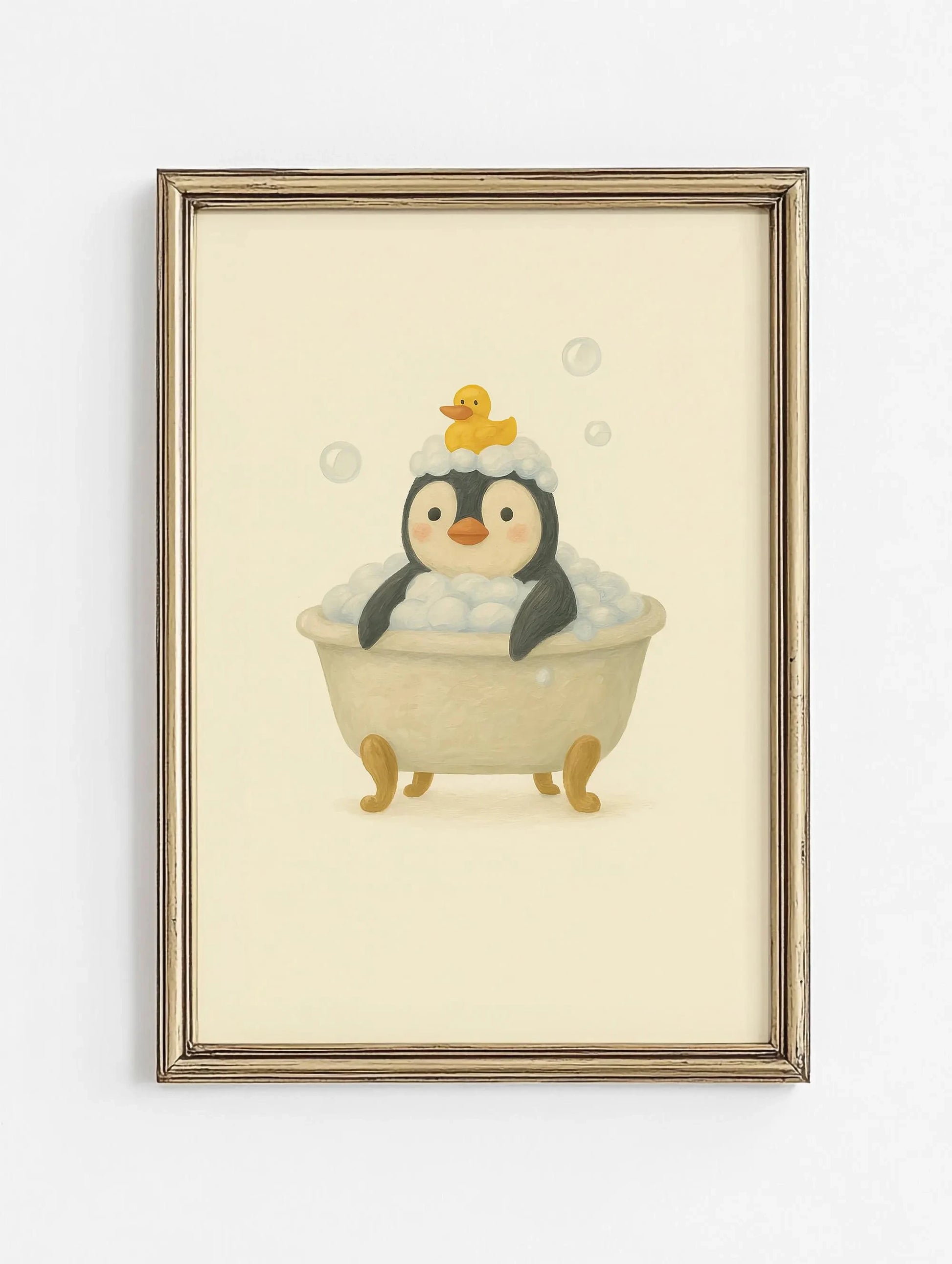 Framed artwork of a penguin taking a bath with a rubber duck on a beige background
