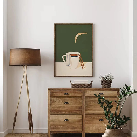 Wooden dresser with a lamp, plant, and framed artwork in a room. Canvas & Curio