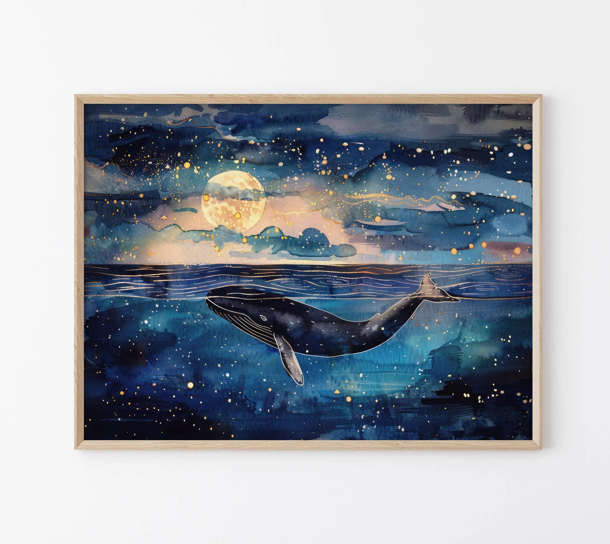 Framed artwork of a whale in water with a night sky and moon.