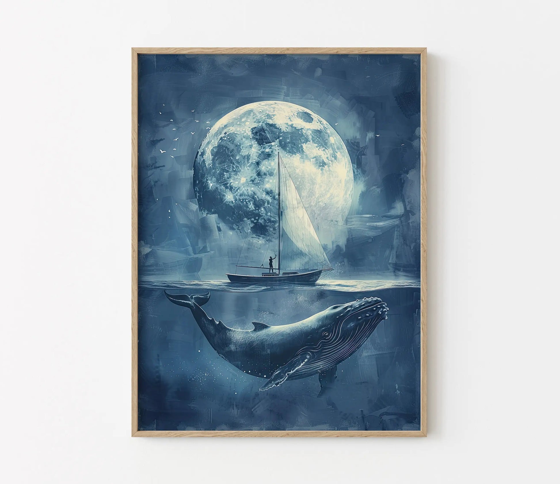Framed artwork of a whale, boat, and full moon on a blue background