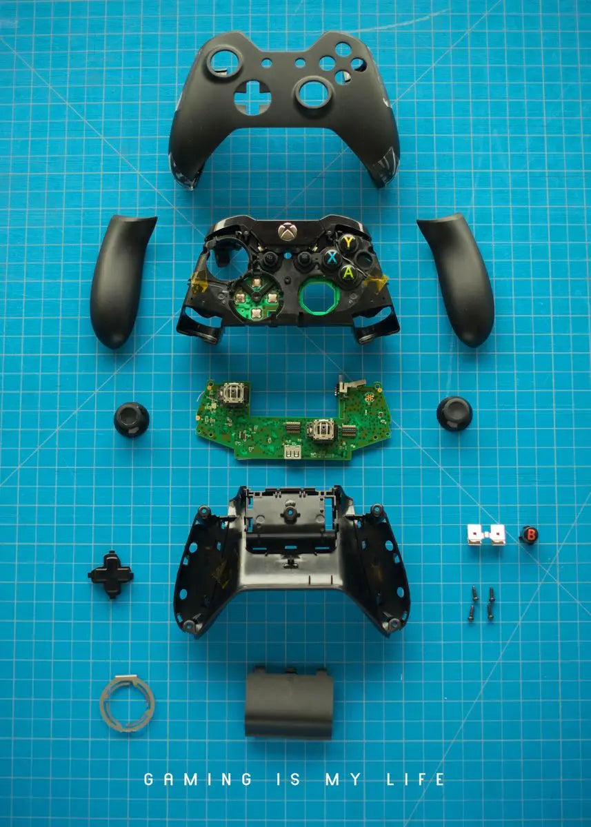 Disassembled gaming controller on a blue grid background with 'Gaming is My Life' text.