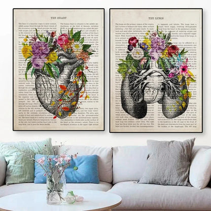 Two framed artworks of floral心脏 designs on a book page background, displayed above a sofa.