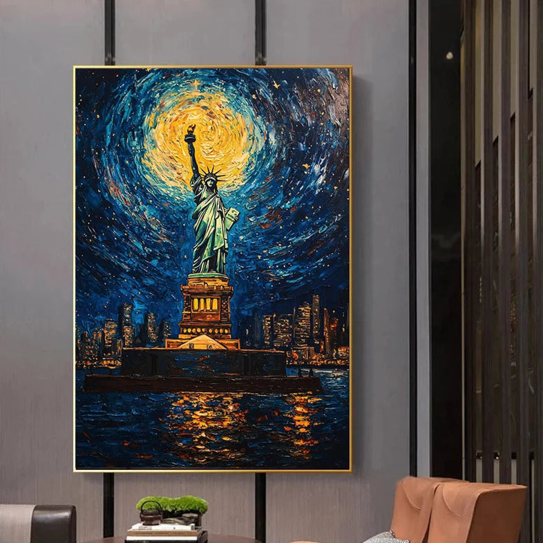 Framed artwork of the Statue of Liberty under a starry night sky, displayed on a wall.