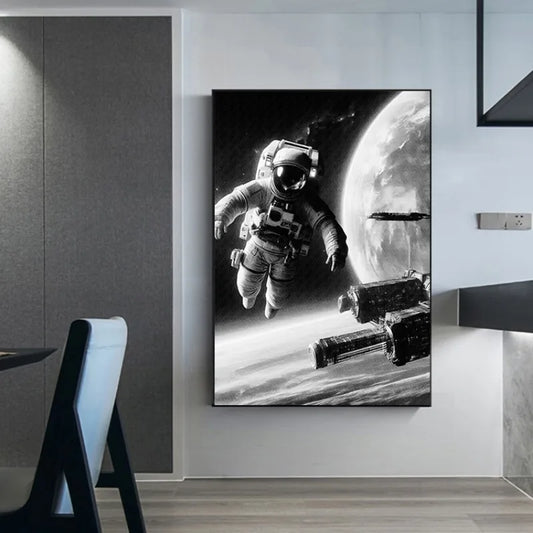 Canvas print of an astronaut in space with a space station and planet in the background, hanging on a wall. Canvas & Curio