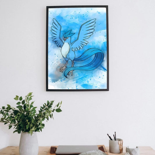 Framed artwork of a blue creature with wings on a white wall above a desk. Canvas & Curio