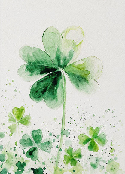 Watercolor illustration of a four-leaf clover on a light background