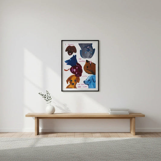 Framed artwork of colorful bear illustrations on a white wall above a wooden bench. Canvas & Curio