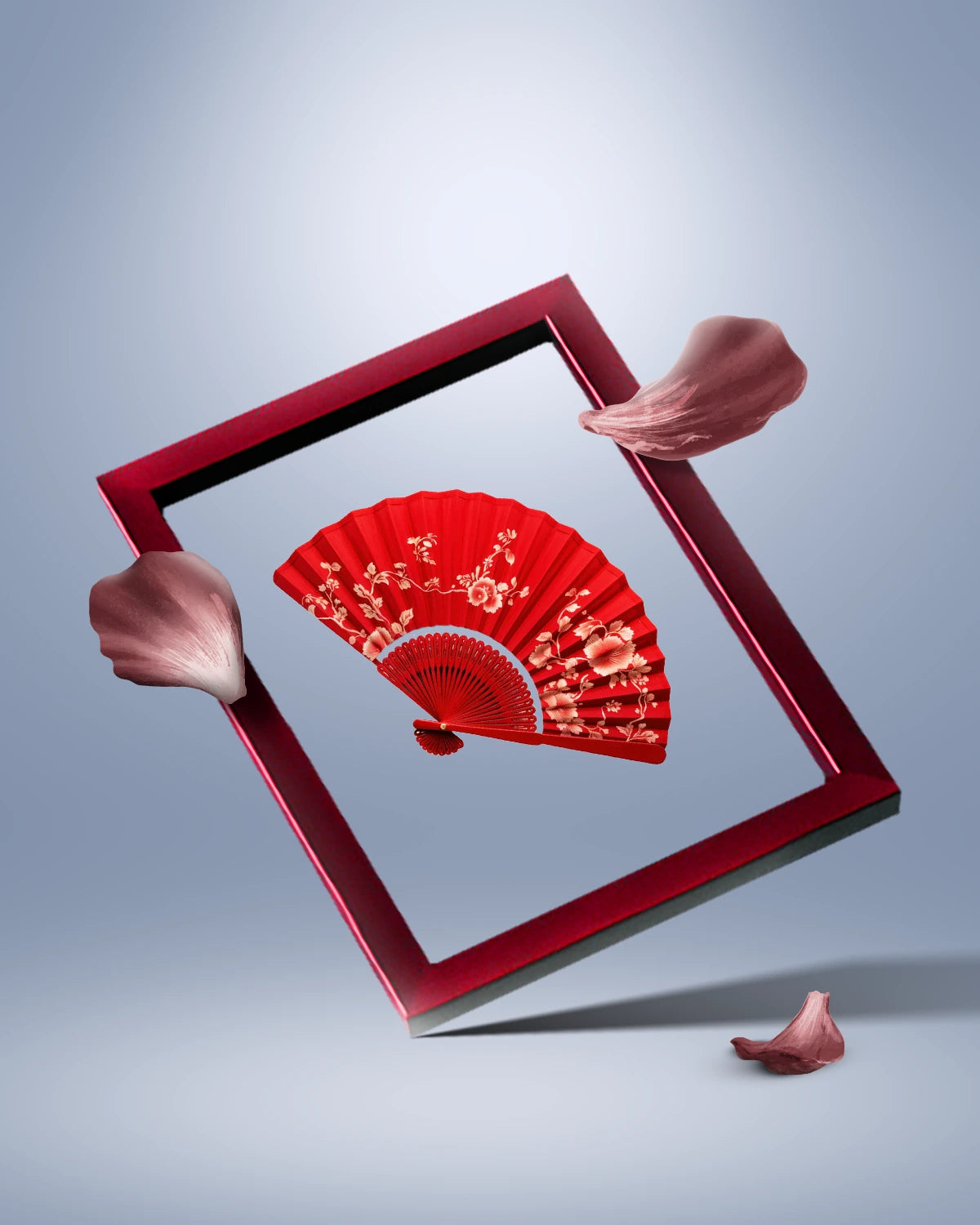 Red decorative fan inside a red square frame on a gray background