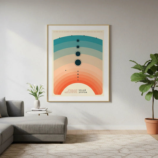 Living room with a gray sectional sofa, framed artwork, and potted plants. Canvas & Curio