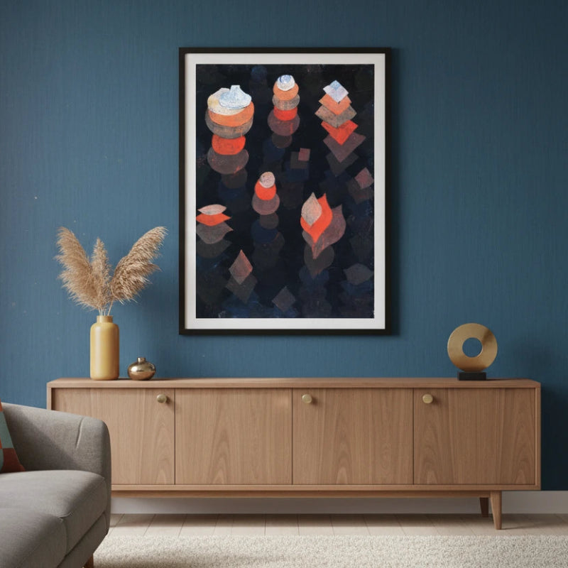 Living room with a gray sofa, wooden cabinet, and abstract art on the wall.